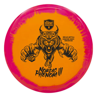 An orange and pink S-Line DD3 disc golf driver - Niklas Anttila Nordic Phenom 3 signature Series.