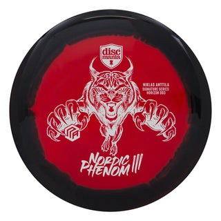 A red and black S-Line DD3 disc golf driver - Niklas Anttila Nordic Phenom 3 signature Series.