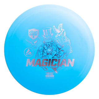 A blue Discmania Active Magician disc golf fairway driver.