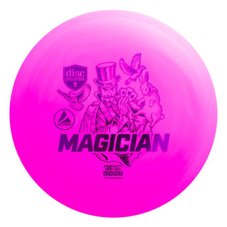 A pink Discmania Active Magician disc golf fairway driver.