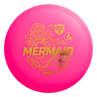 A pink Discmania Active Mermaid disc golf fairway driver.