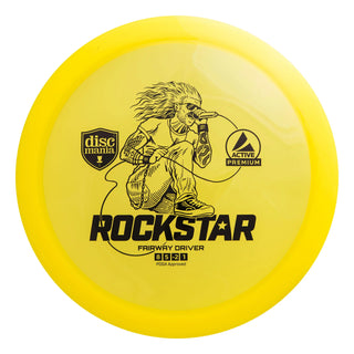 A yellow Discmania Active Premium Rockstar disc golf fairway driver.