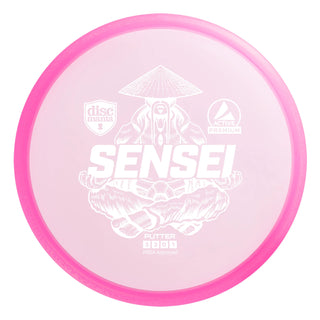 A pink Discmania Active Premium Sensei disc golf putter.