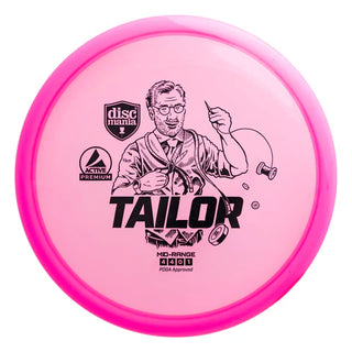 A pink Discmania Active Premium Tailor disc golf midrange.