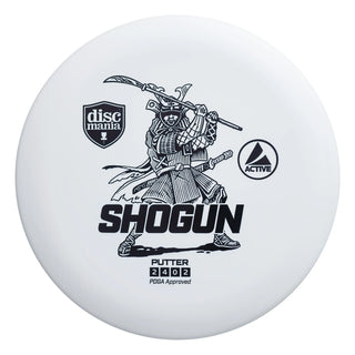 A white Discmania Active Shogun disc golf distance driver.