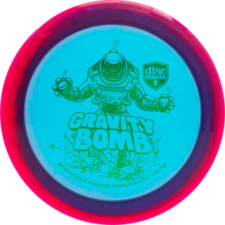 A turquoise and red Discmania C-Line Horizon PD2 Gravity Bomb disc golf distance driver - Gavin Babcock signature series.