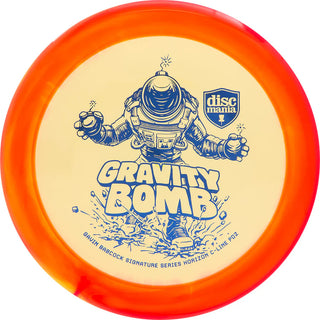 A yellow and red Discmania C-Line Horizon PD2 Gravity Bomb disc golf distance driver - Gavin Babcock signature series.