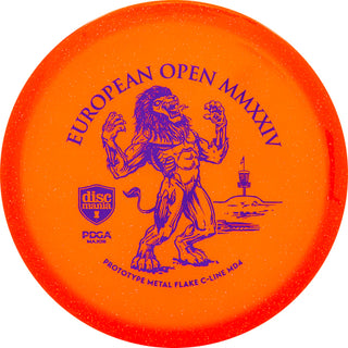 An orange Discmania C-Line Metal Flake MD4 disc golf midrange - European Open 2024 edition.