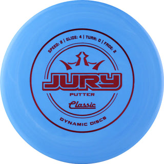 A blue Dynamic Discs Classic Jury disc golf putter.