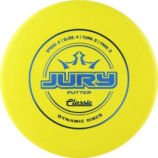 A yellow Dynamic Discs Classic Jury disc golf putter.