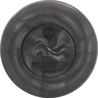 A black and gold Discmania D-Line Flex 2 Swirl P1X disc golf putter - 10-Year Anniversary edition.
