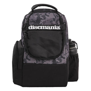 Front view of a grey and black camoflague pattern Discmania Fanatic Fly disc golf backpack that is closed.
