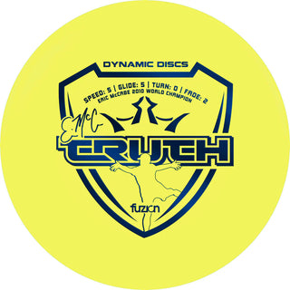 A yellow Dynamic Discs Fuzion Emac Truth disc golf midrange.