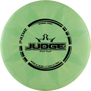 A green and white Prime Burst Judge disc golf disc.