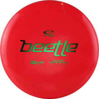 A red Biogold Beetle disc golf disc.