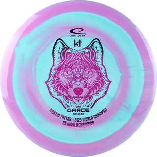 A pink and blue Grand Orbit Grace disc golf disc.