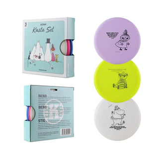 A moomin-themed disc golf set showing all three discs that are included and the front and back view of the box.