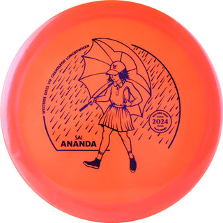 An orange VIP Chameleon Longbowman disc golf disc.