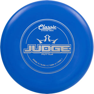 A blue Classic Blend Judge disc golf disc.