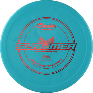 A turquoise Classic Blend Sockibomb Slammer disc golf disc.