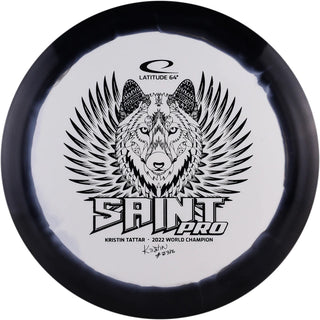 A white and black Gold Orbit Saint Pro disc golf disc.