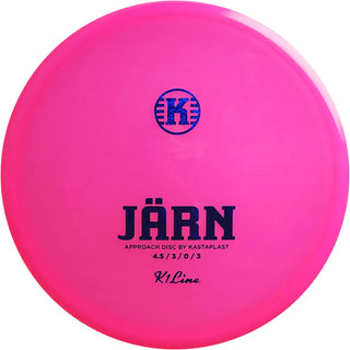 A pink K1 Järn disc golf disc.