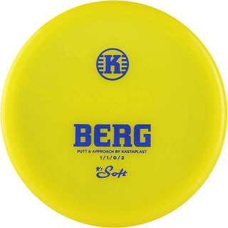A yellow K1 Soft Berg disc golf disc.