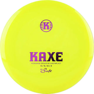 A yellow K1 Soft Kaxe disc golf disc.