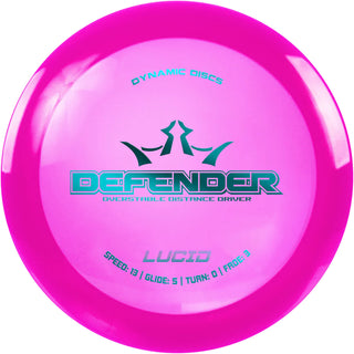 A pink Lucid Defender disc golf disc.