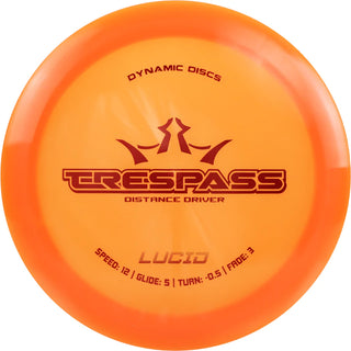 An orange Lucid Trespass disc golf disc.