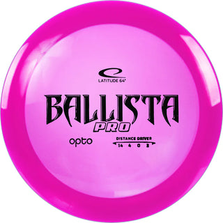 A pink Opto Ballista pro disc golf disc.