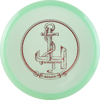 A green Opto Moonshine Anchor disc golf disc made in luminescent plastic.