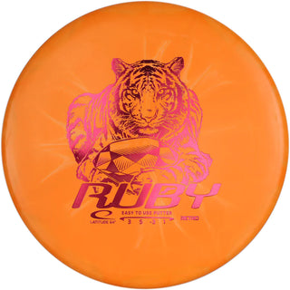 An orange Retro Burst Ruby disc golf disc.