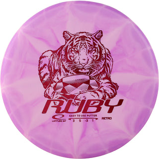 A pink and white Retro Burst Ruby disc golf disc.