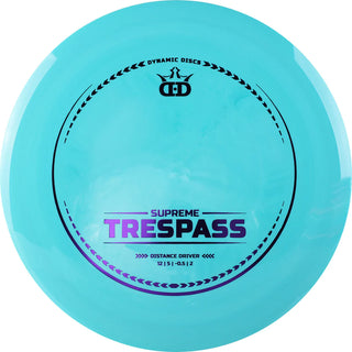 A turquoise Supreme Trespass disc golf disc.