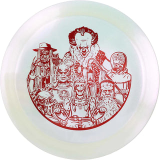 A transparent VIP Glimmer Boatman disc golf disc with Halloween characters stamped on it.