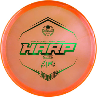 An orange VIP Ice Glimmer Harp disc golf disc.